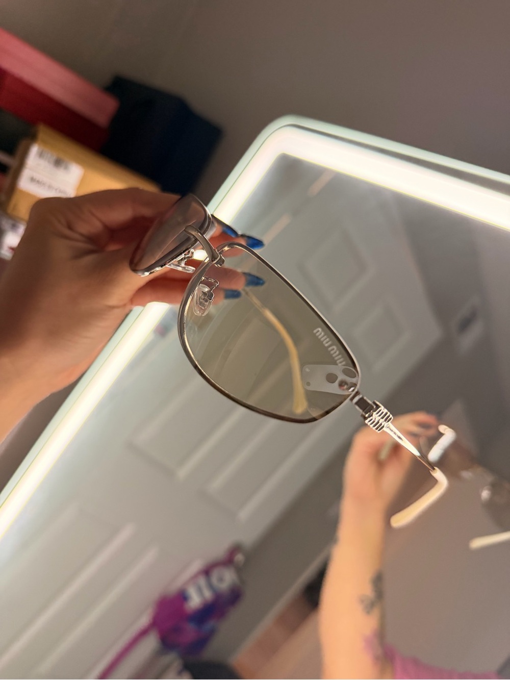Miu Miu Silver Rimless Sunglasses with Gray Lenses